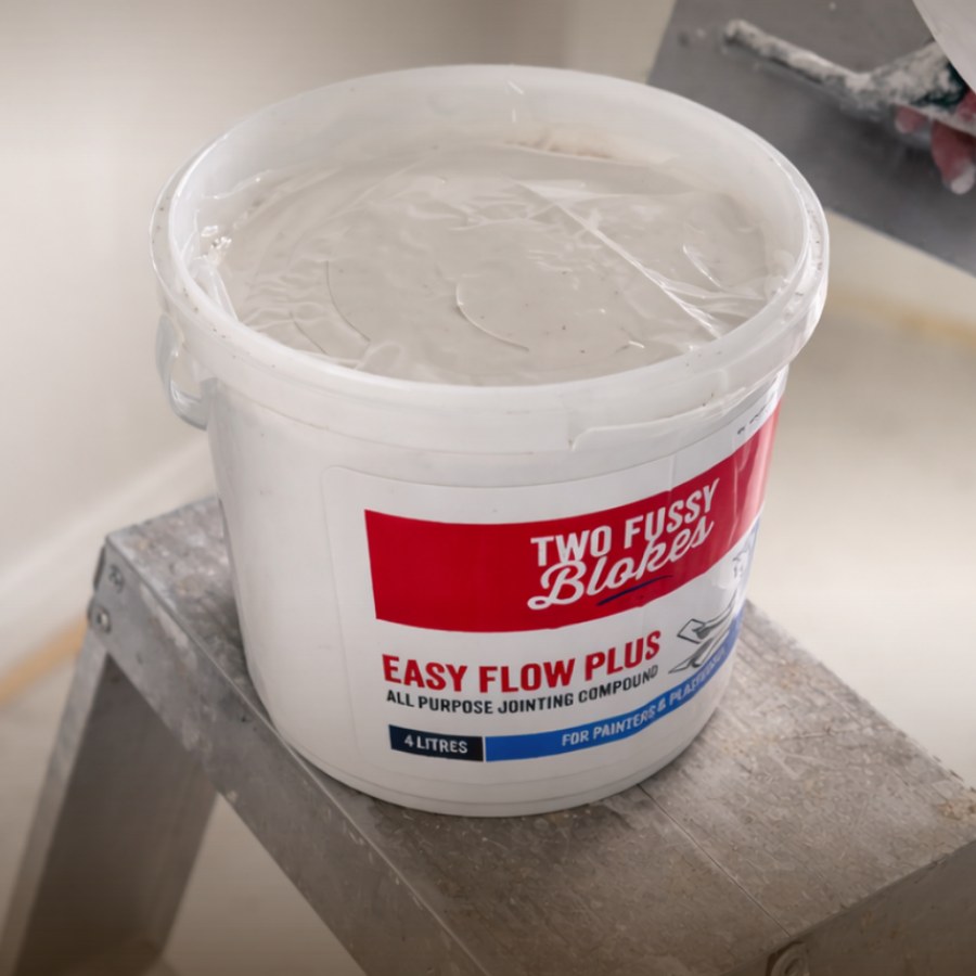 An open 4L bucket of Easy Flow Plus on a stepladder